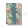 Load image into Gallery viewer, Gif showing how the journal looks with personalised monogram on floral design with pink flowers and green leaves on a blue background