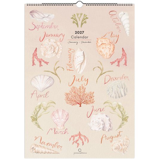 A spiral-bound 2027 calendar page featuring an ocean-themed design with illustrated seashells, coral, and handwritten month names in coral and sage green on a warm cream background.