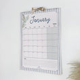 Load image into Gallery viewer, Wall calendar for January 2027 with decorative elements on a white background
