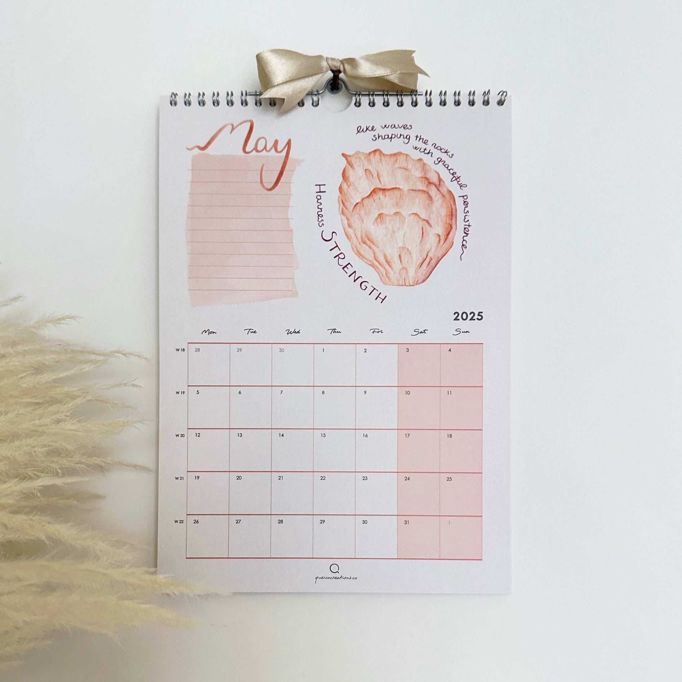 Calendar with a decorative bow on a light background