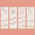 Load image into Gallery viewer, Four vertical calendar pages for November, December, January, and February on a pink background.
