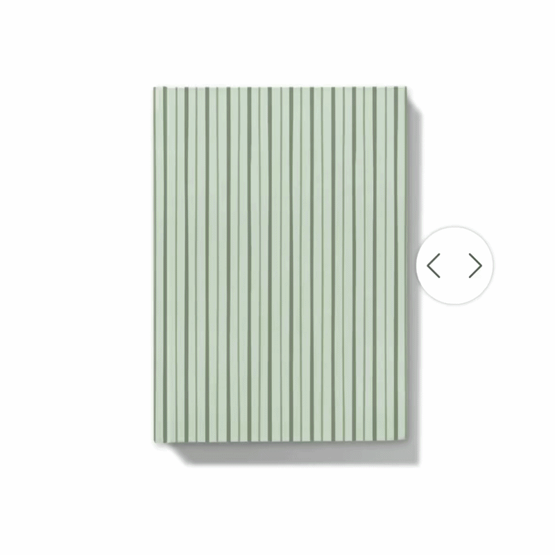 Gif showing how the journal can be personalised with a floral monogram on notebook with green shades striped cover 