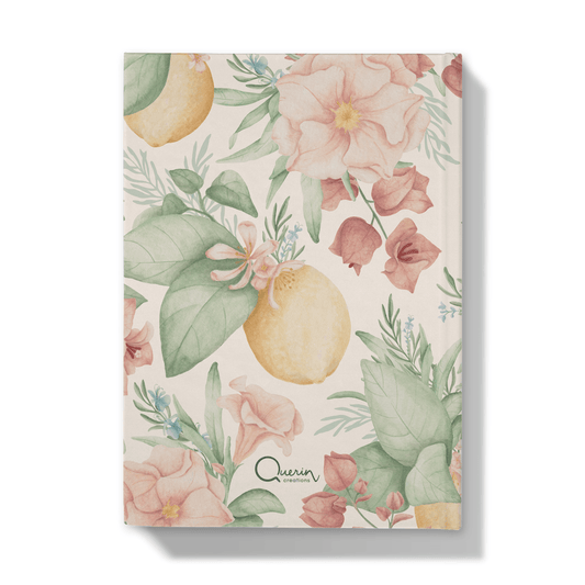 Back of notebook with lemons and mediterranean flowers pattern on a blush pick background