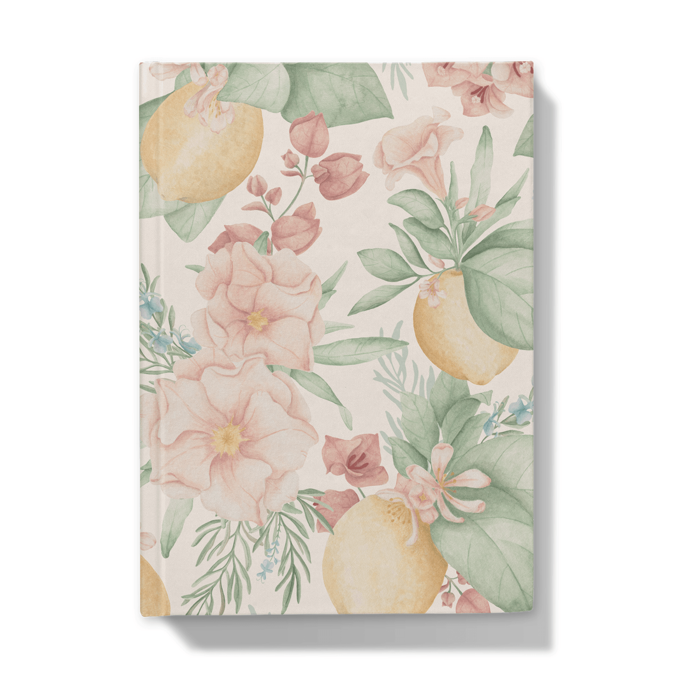 Front of notebook with lemons and mediterranean flowers pattern on a blush pick background