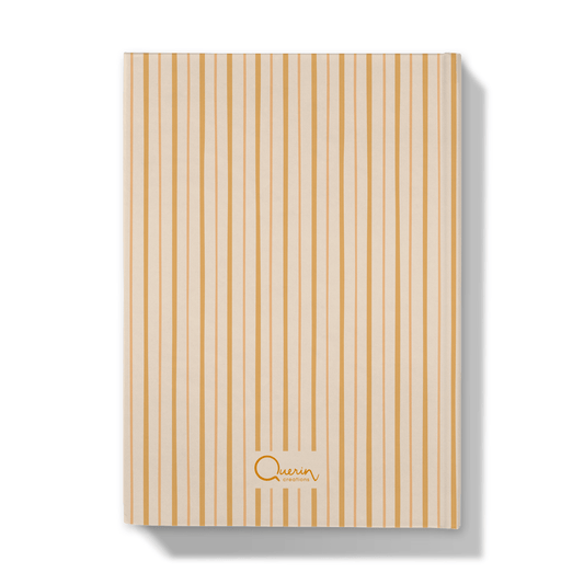 Back of a notebook with yellow shades striped cover on a white background