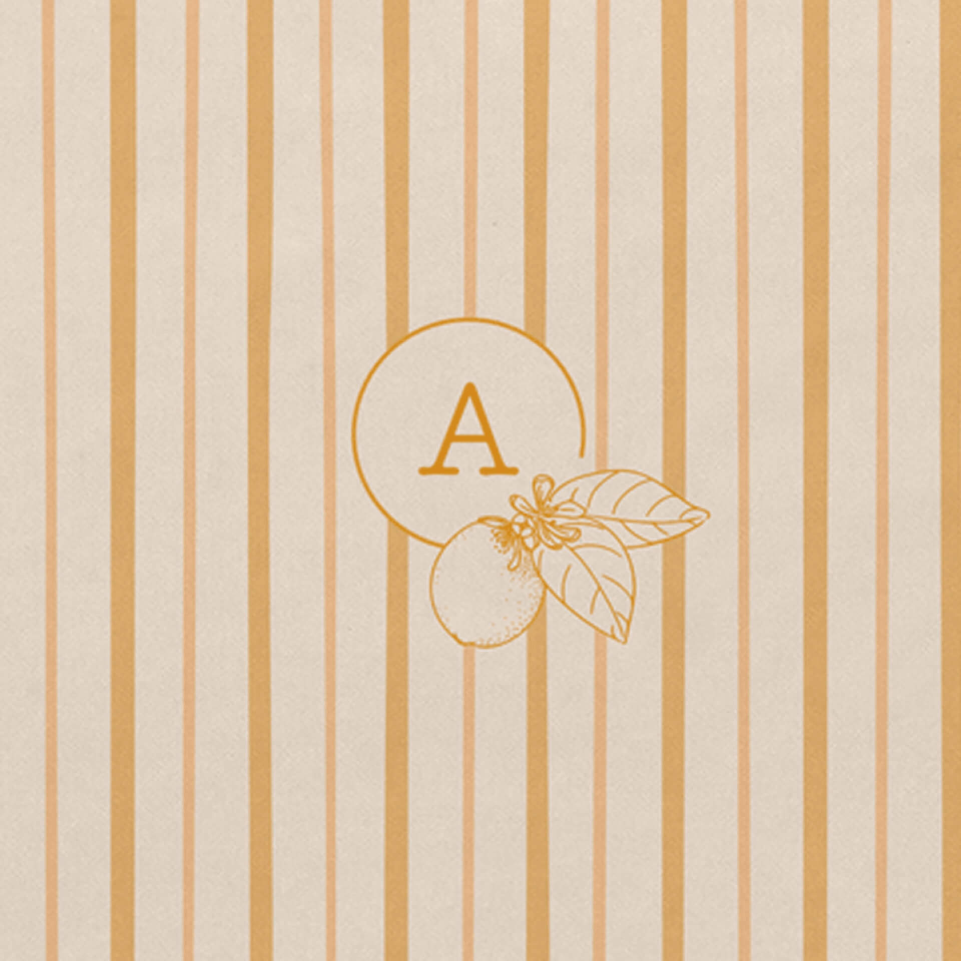 Detail of floral monogram with lemon flowers and leaves on notebook with yellow shades striped cover 