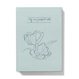 Querin Creations Hardcover Journal with tulip design and text on a light blue background, floral stationery collection 